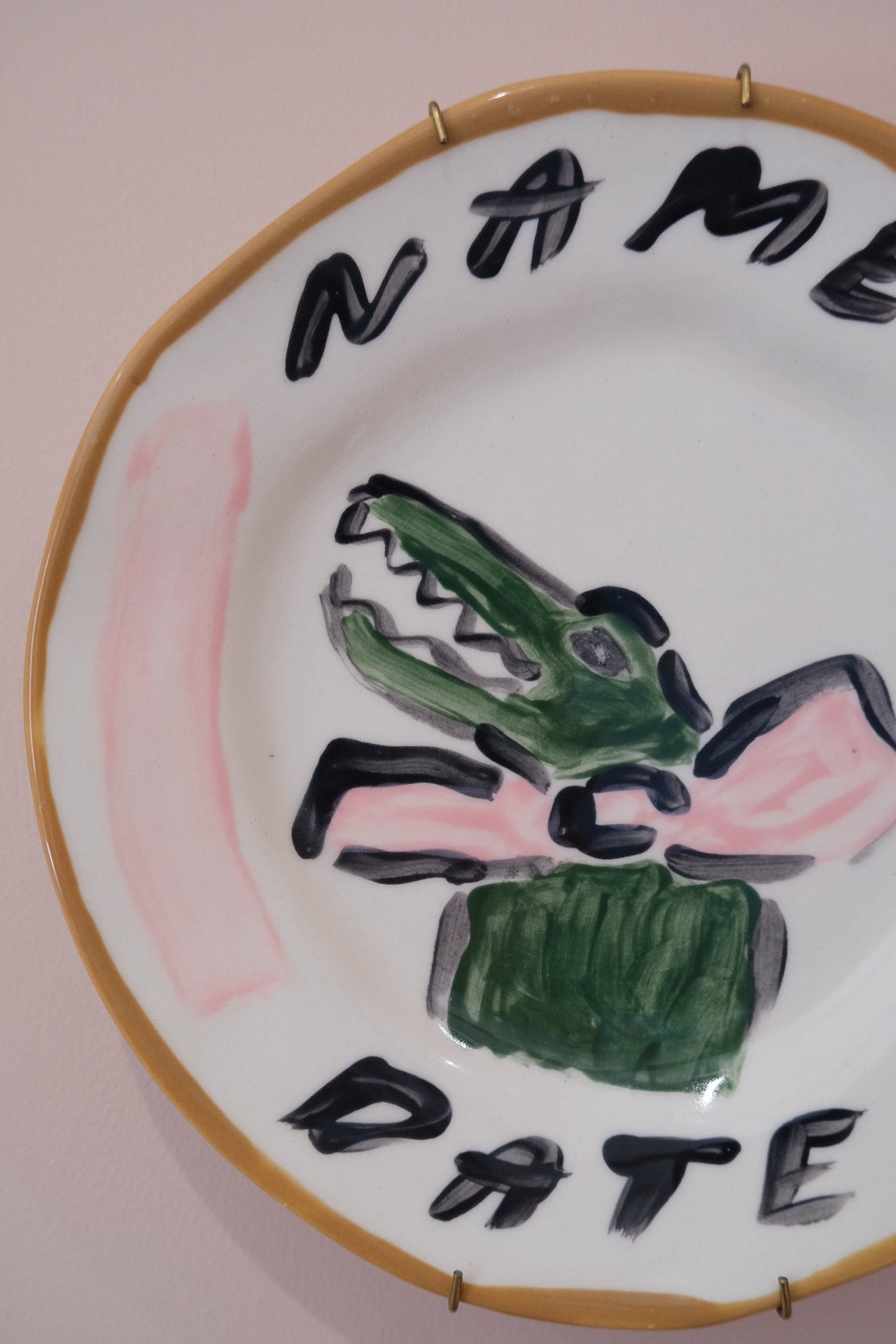 Details of a custom decorative plate by Tatiana Alida Design