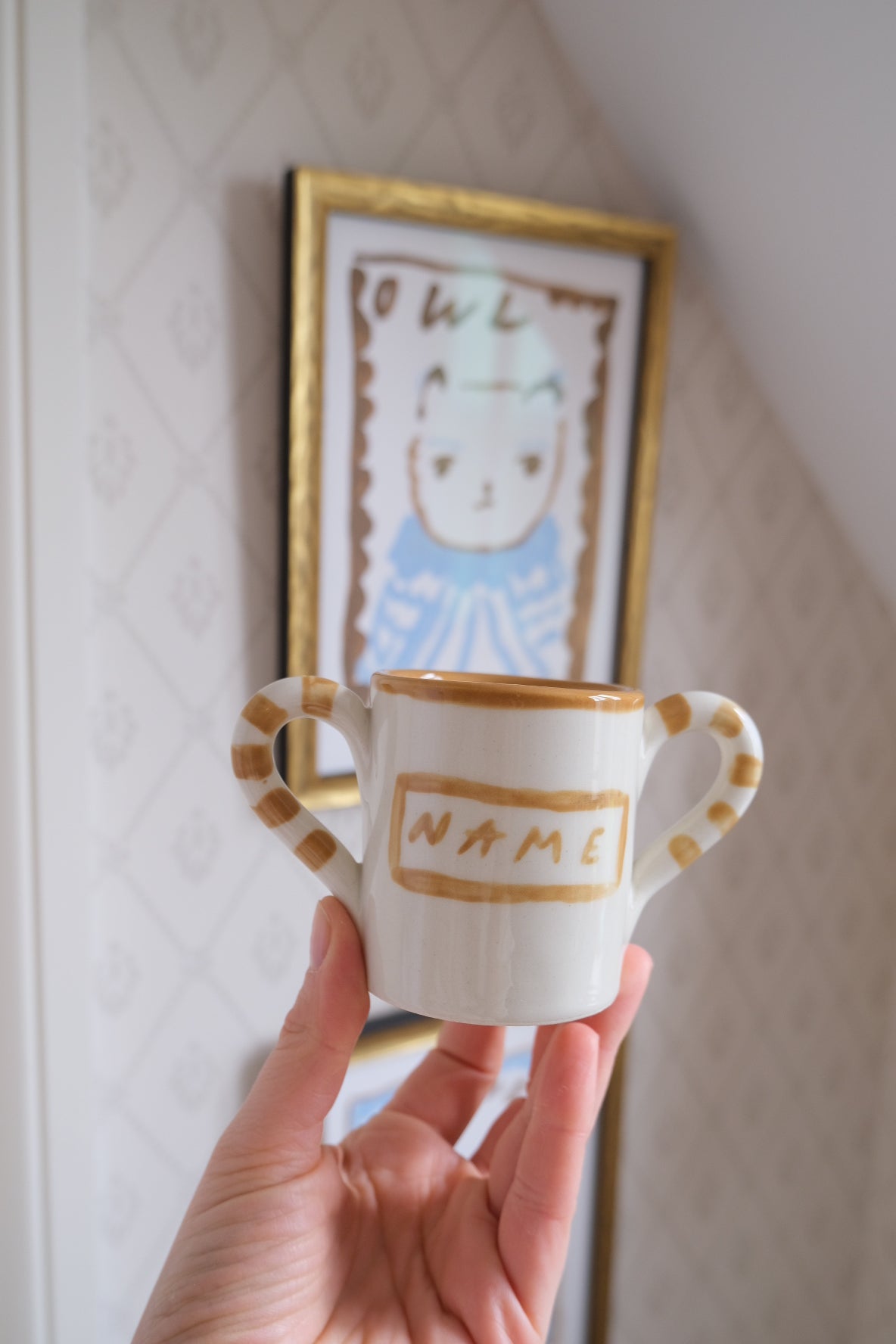Personalised baby mug in white and beige ceramic