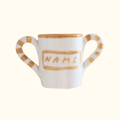 Personalised baby mug in white and beige ceramic, a unique gift