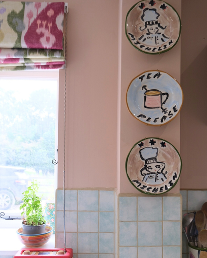 Decorative, hand-painted plates that are perfect for display in the kitchen - by Tatiana Alida